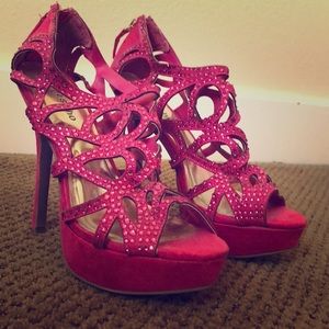 Magenta jeweled stilettos